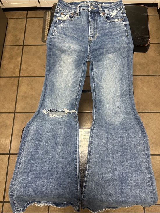 American Eagle Outfitters Denim - American Eagle Outfitters Medium Blue Flare Jeans with Knee Rip